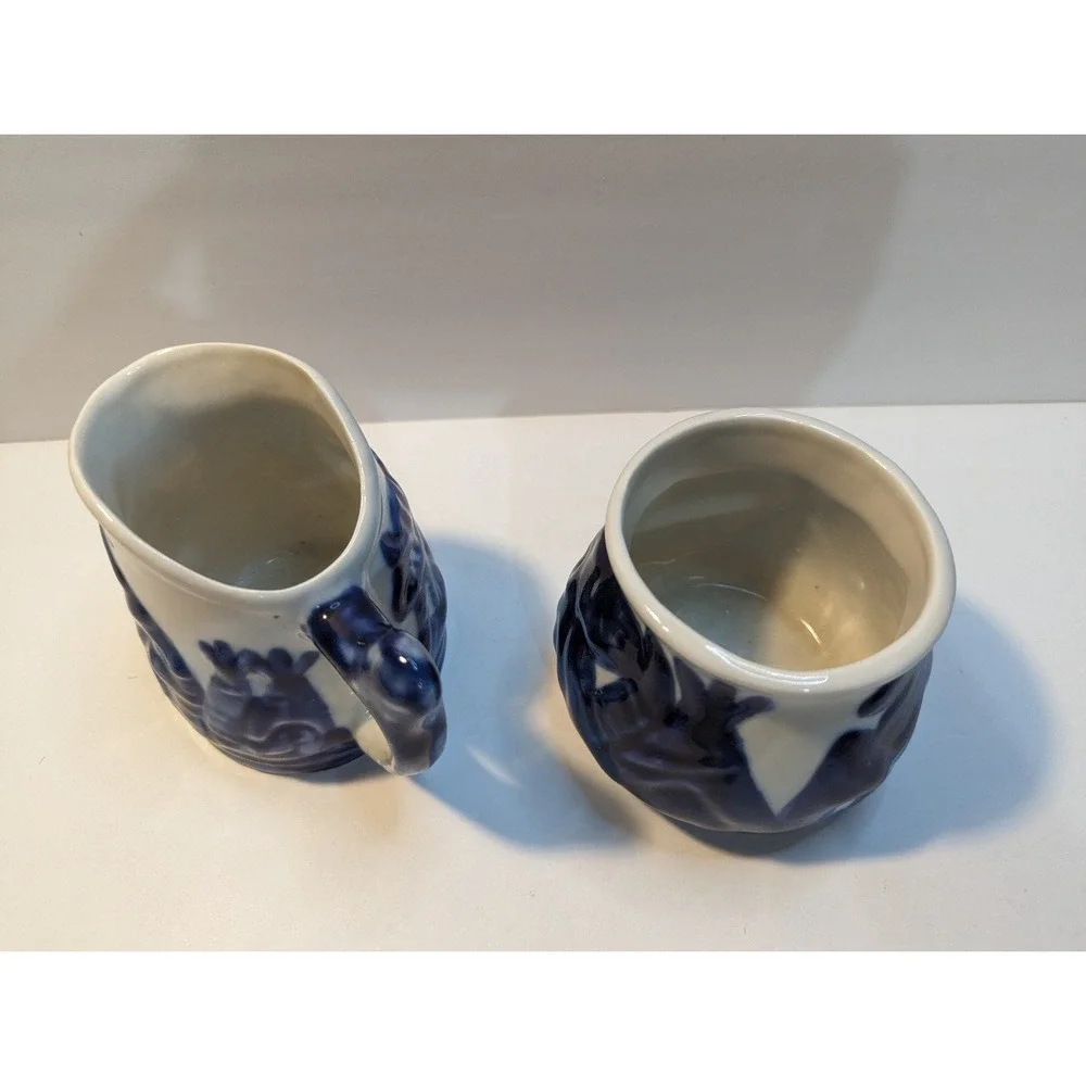 Indian chief head and Teepee creamer and‎ sugar